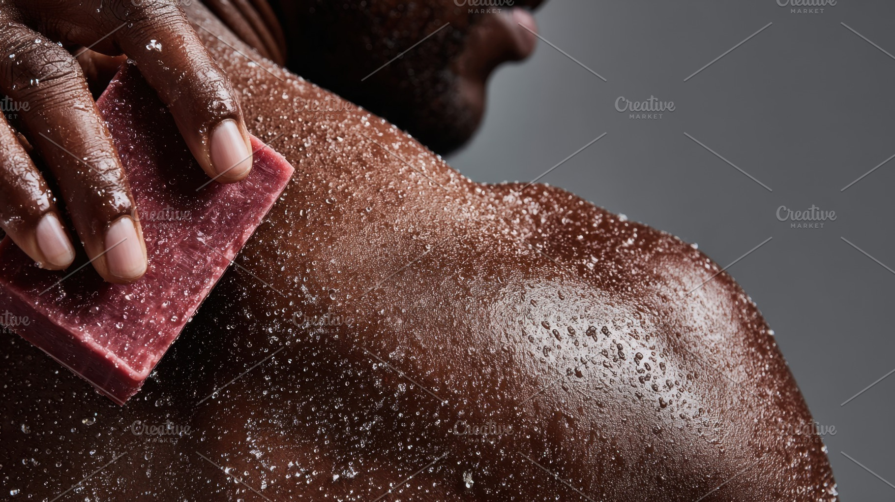 Man scrubs back with soap, a Photo by Beautiful things