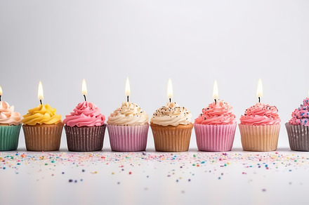 Illustration of birthday cupcakes with candles, a Food & Drink Photo by AlyaAnd