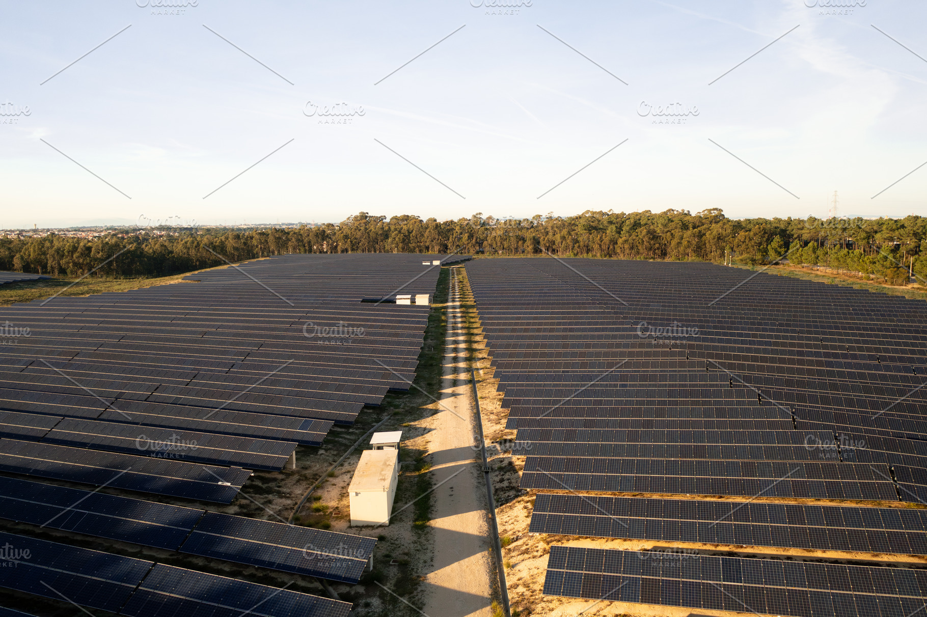 Rows of solar panels arranged in parallel lines under sky, a Photo by andreonegin market