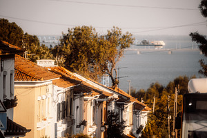 Riverside Homes Overlook Cargo Ship, an Architecture Photo by SkyNext