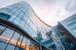 Modern building with glass design, a Photo by Beautiful things