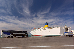 Ferry and tour bus in Heraklion port, a Transportation Photo by kavalenkava