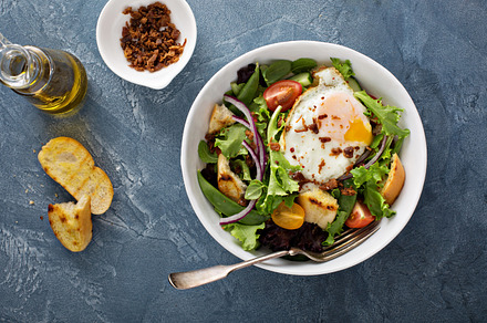Breakfast salad with eggs and bacon, a Food & Drink Photo by farwasser