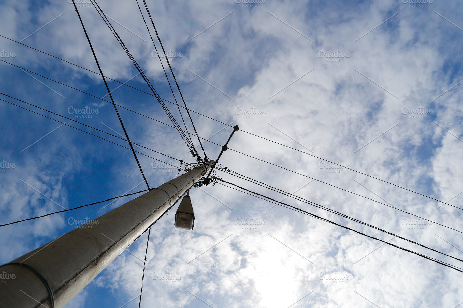 Electric Pole and Wires Against a Br, an Industrial Photo by bastera