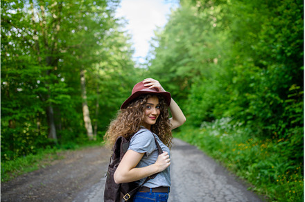 Young tourist woman traveller with, a Person Photo by HalfPoint