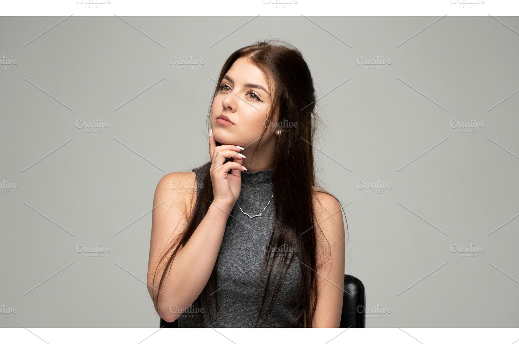 Young woman thinking, contemplating, a Person Photo by volodymyrshtun13795