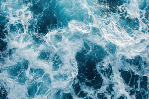 Foamy waves rolling up the shore, a Photo by Pavel_design