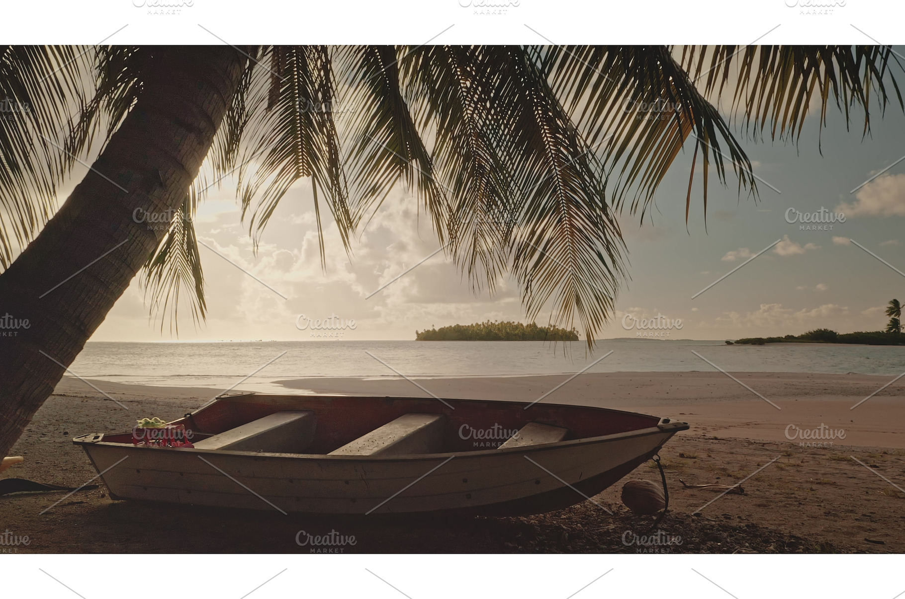 Boat resting on a tropical beach at, a Nature Photo by Goinyk