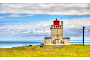 Lighthouse at dyrholaey cape of iceland stock photo containing iceland and, a Nature Photo by Leonid Andronov