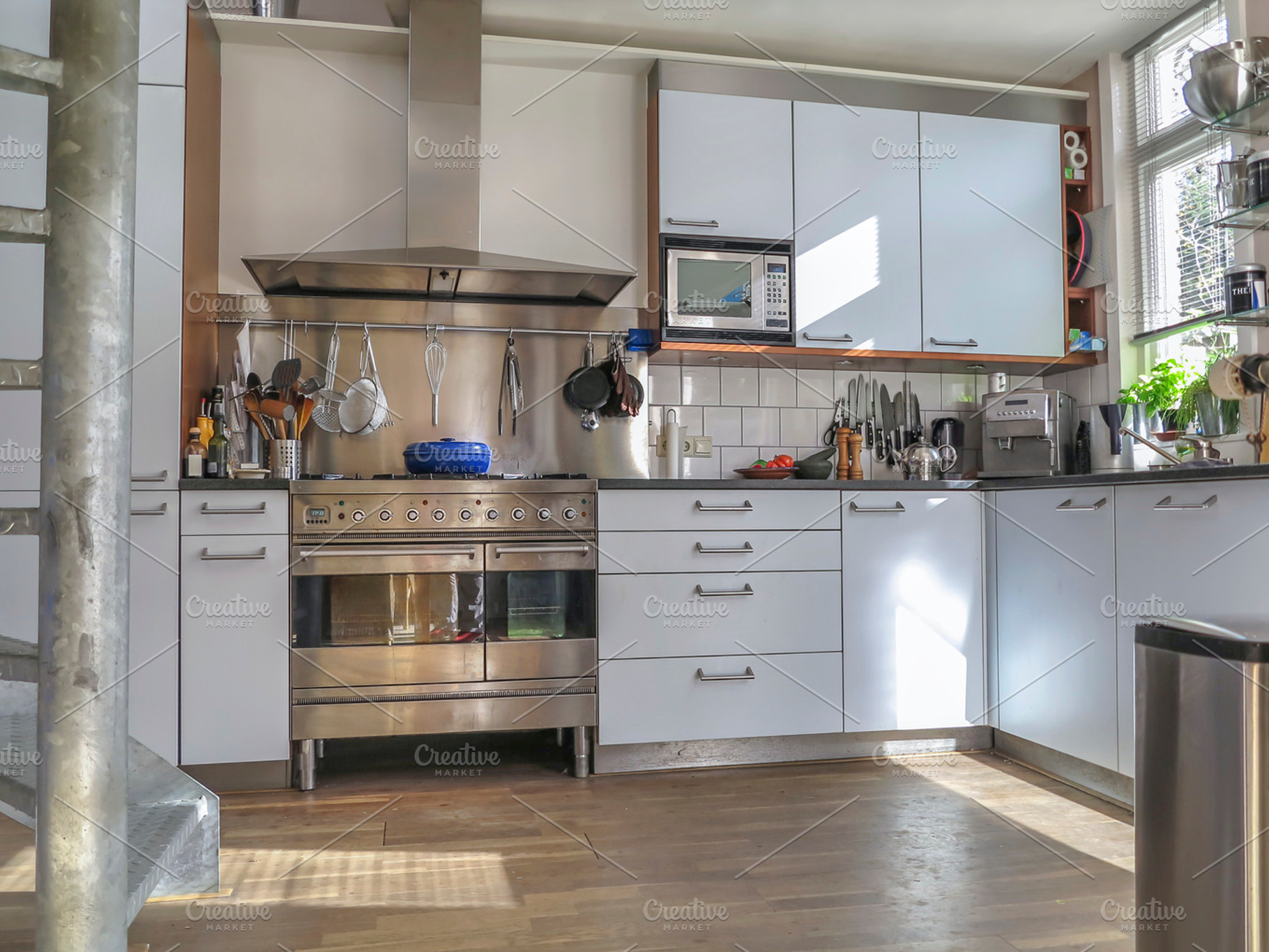 Modern kitchen containing house, appliance, and built-in, a Food & Drink Photo by Patricia Hofmeester