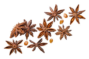 Star anise and seeds flying close-up, a Food & Drink Photo by innakreativ