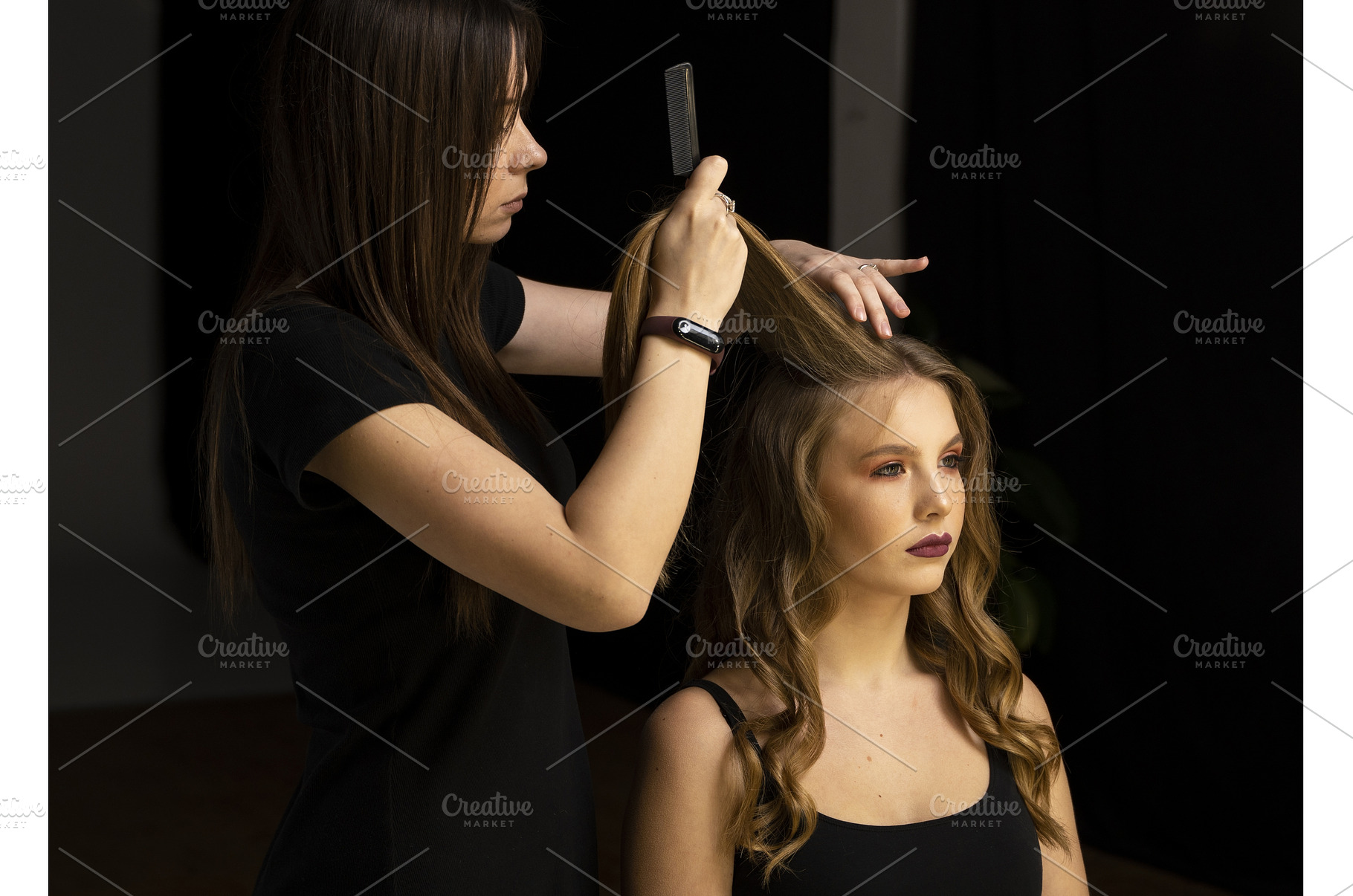 Hairdresser combing and lifting, a Beauty & Fashion Photo by volodymyrshtun13795