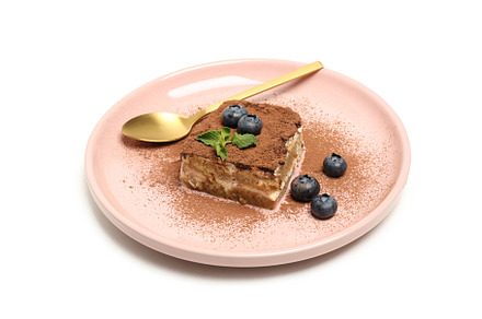 Concept of sweet food, tasty Tiramisu cake, isolated on white ba, a Food & Drink Photo by AtlasStudio PRO