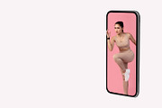 Sporty Lady Exercising Jumping From Smartphone Screen Over Gray Background, a Photo by Prostock-Studio (Thumbnail 1 of 3)