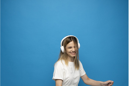Happy blonde woman with a white, a Person Photo by volodymyrshtun13795