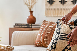 Afrobohemian home interior design with cushions and decor, perfe, a Photo by Dvoevnore photos