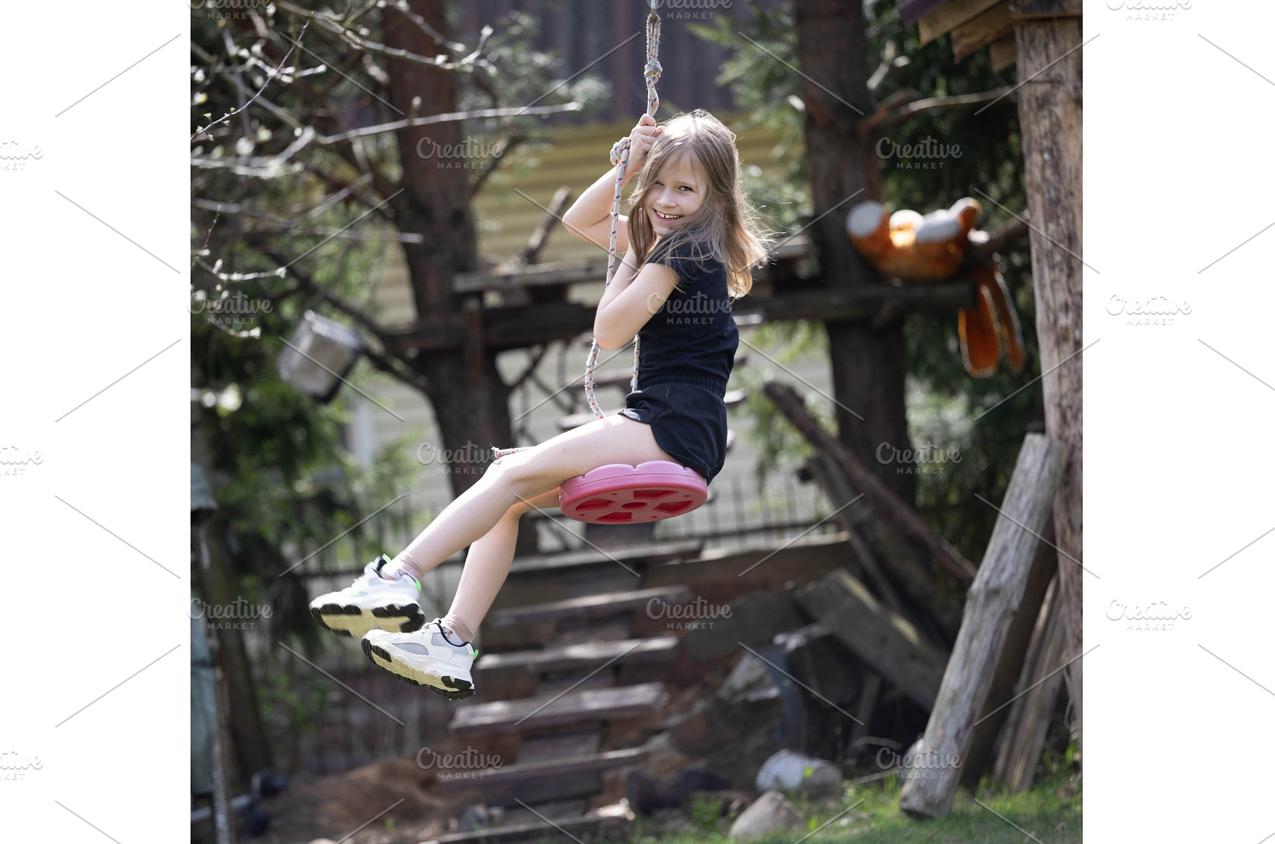Little happy girl on a bungee, a Person Photo by Nenahliadava Design