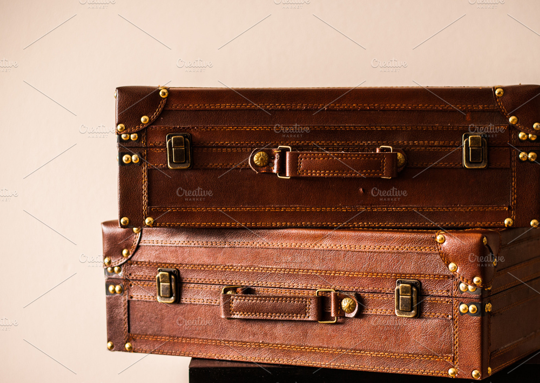 Two Leather Suitcases, a Person Photo by Bloor