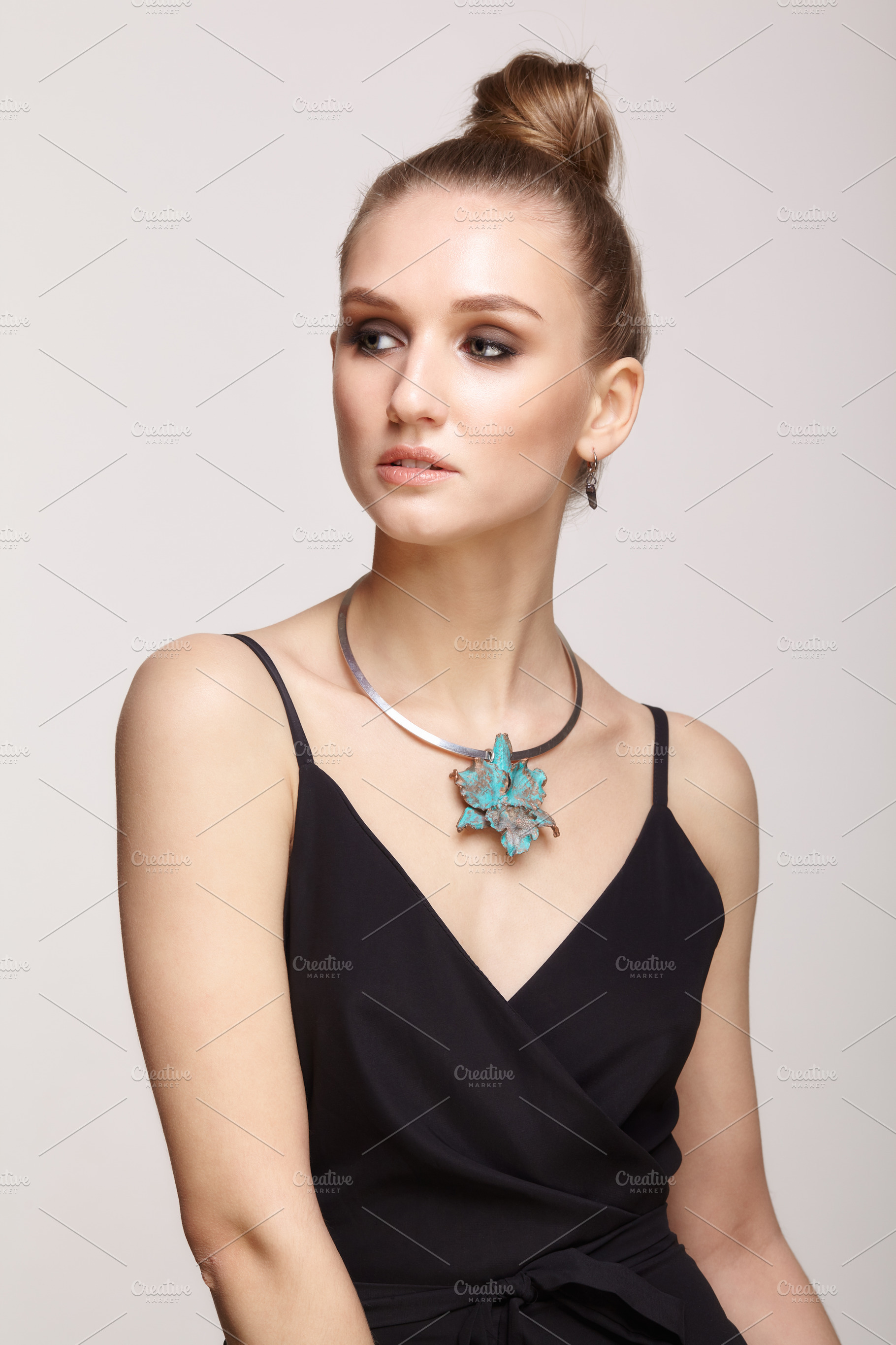 Beautiful woman in collar and earrings in form of leaf, a Beauty & Fashion Photo by Zastavkin