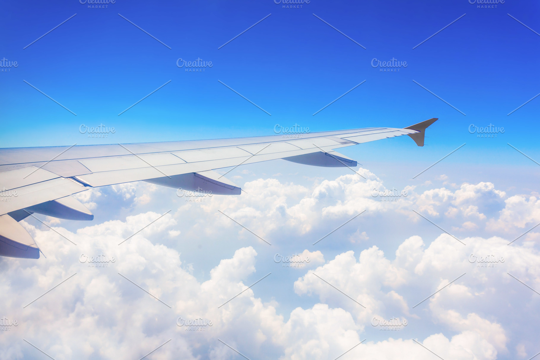 Airplane wing, a Photo by saiko3p