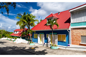 Colorful cottages with red roofs in Gustavia, Saint Barthelemy, an Architecture Photo by Leonid Andronov