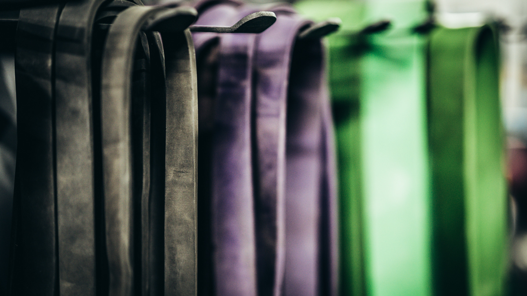 Resistance Bands At A Gym On A Rack, a Photo by Snake Eye Media