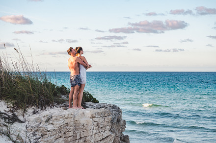 Handsome man and pretty woman stand against the backdrop of a rock, a Person Photo by Svetlana Barchan