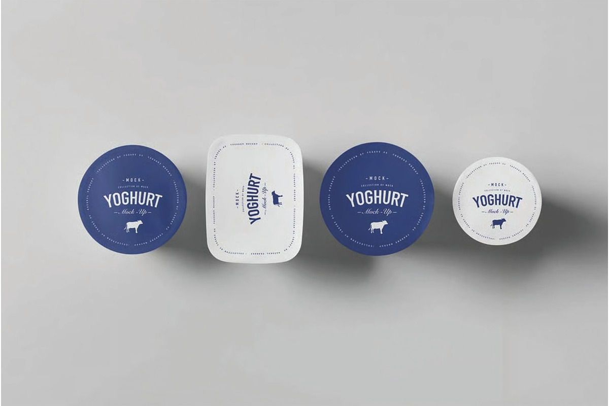 Top View Of Four Yoghurt Lids Mockup, a Packaging Mockup by DesignRushMarket (Photo 2 of 2)