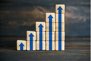 Wooden blocks stacked as blue arrow, a Business Photo by Gladkov photography