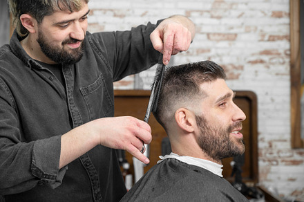 Work at the barber shop, a Person Photo by david.herraez.calzad