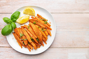 Roasted sweet potato fries with basil and lemon, a Food & Drink Photo by Olena Rudo