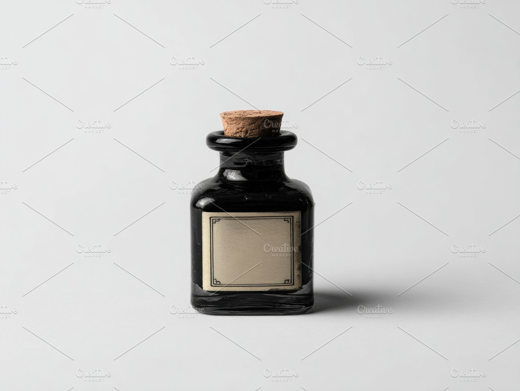 Black ink bottle on white background, a Beauty & Fashion Photo by Virgo Studio