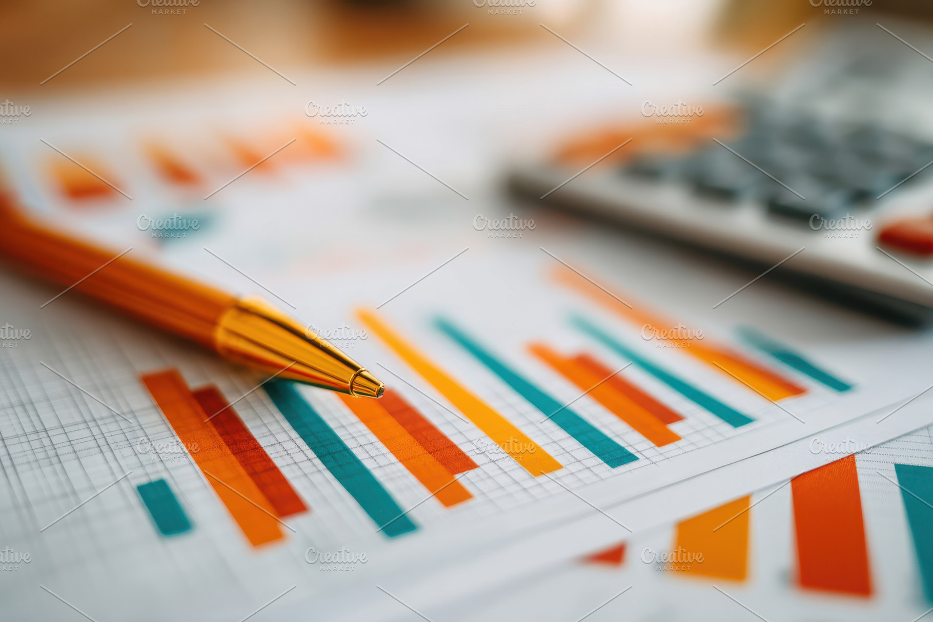 Colorful financial report with graphs and calculator, a Business Photo by AlyaAnd