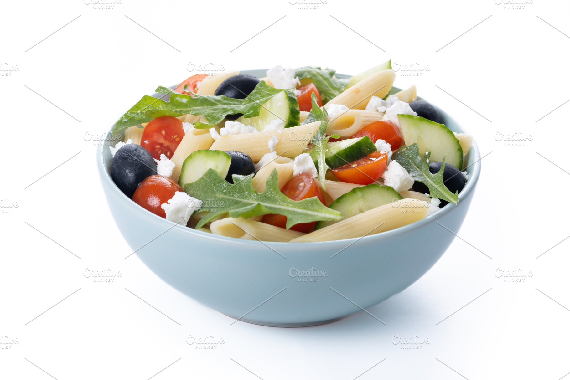 Mediterranean Pasta Salad with Fresh Vegetables and Herbs isolated on white bac, a Food & Drink Photo by etorres69