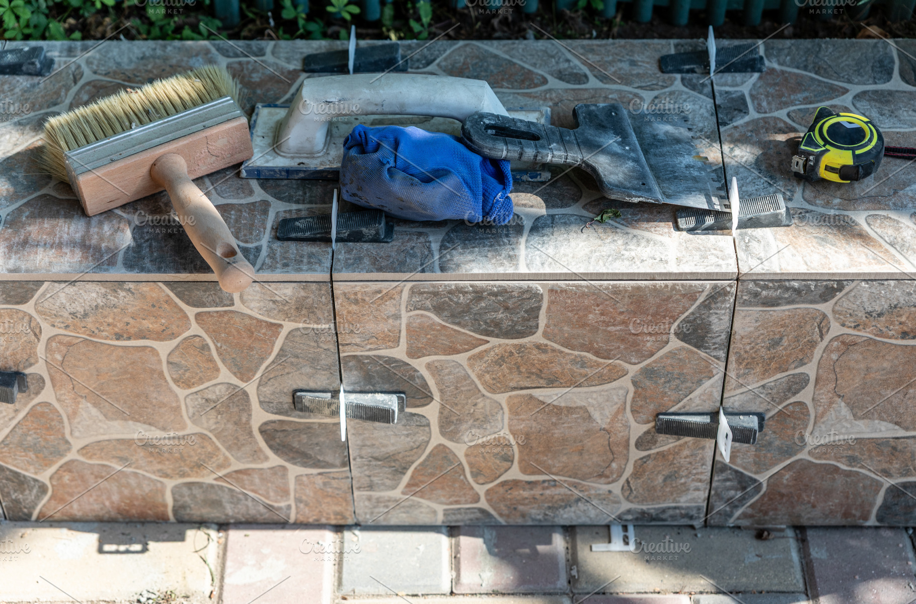 Construction Tools on Stone Surface, an Architecture Photo by Ales Munt