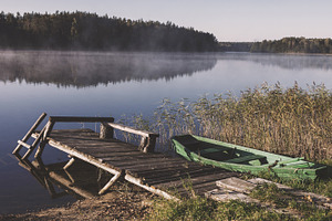 Foggy lake with bridge and boat, a Nature Photo by BOOCYS