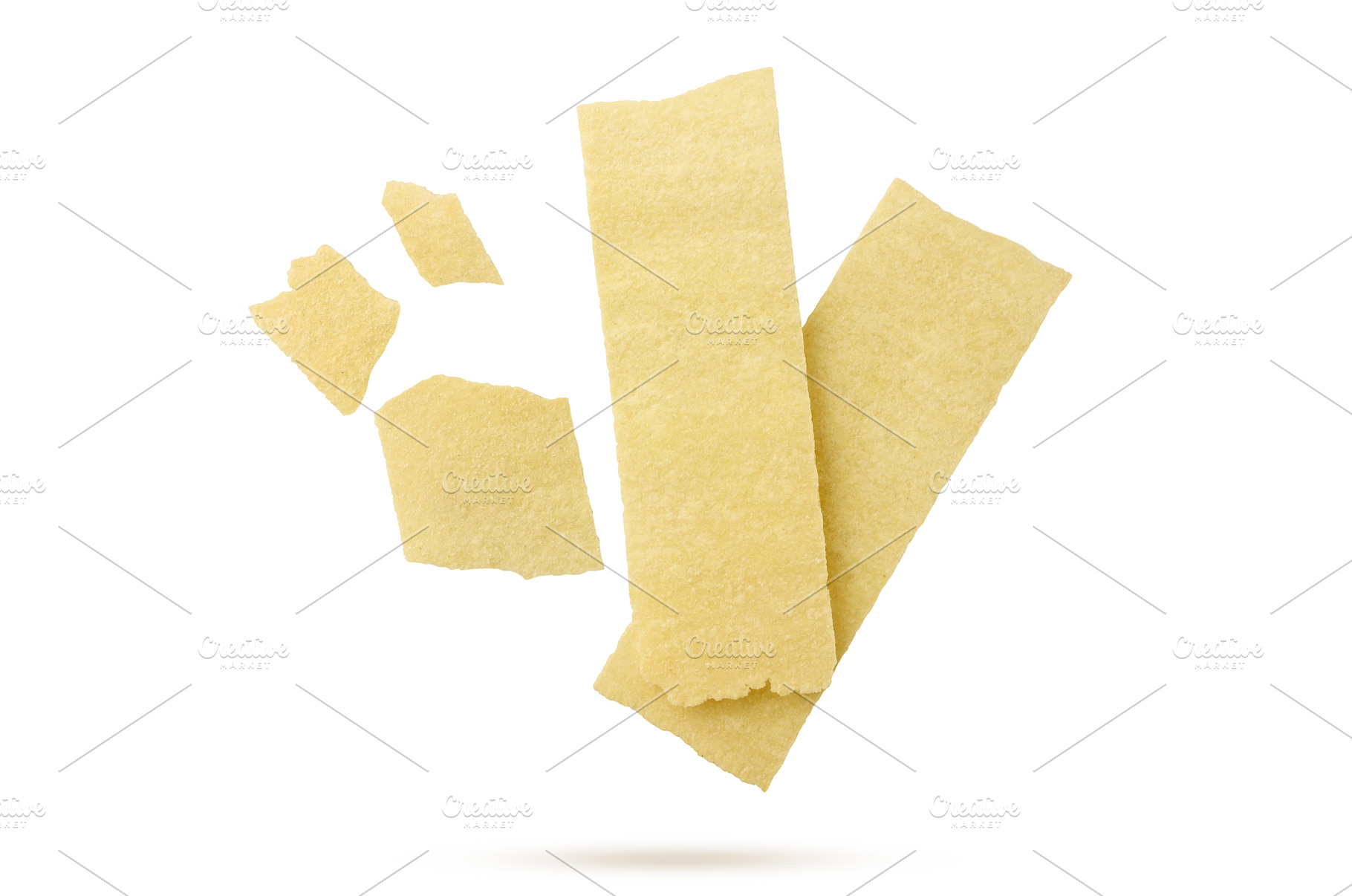Long potato chips and pieces flying, a Food & Drink Photo by innakreativ