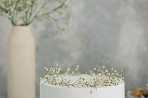 White wedding cake with flowers