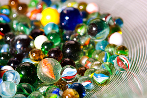 Stack of Marbles In Bowl, an Abstract Photo by THP Creative