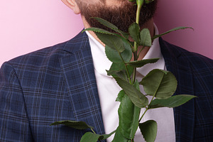 Man Holding Red Rose, a Person Photo by Ales Munt