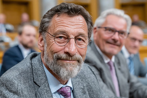 Smiling senior businessman with glasses and beard in formal atti, a Photo by José Manuel Gelpi