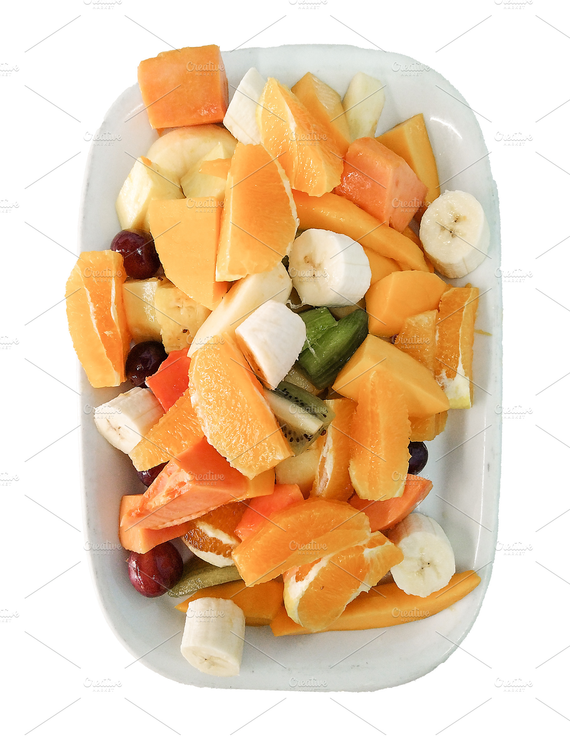 Fresh fruit salad on a white plate, a Food & Drink Photo by DanFLCreativo