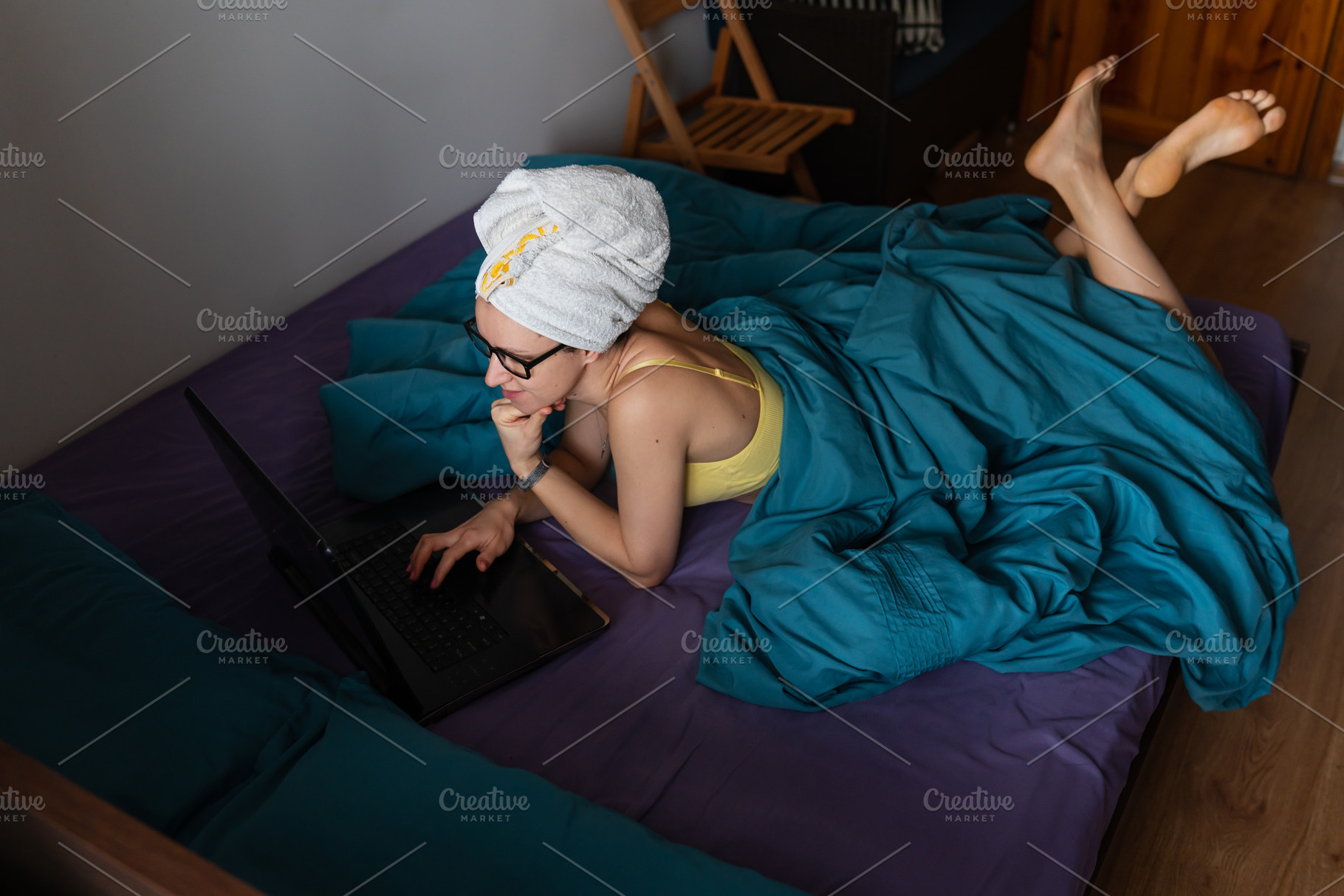 Home office, telecommuting, isolation, quarantine. A young girl working on a la, a Person Photo by Artsaba Family