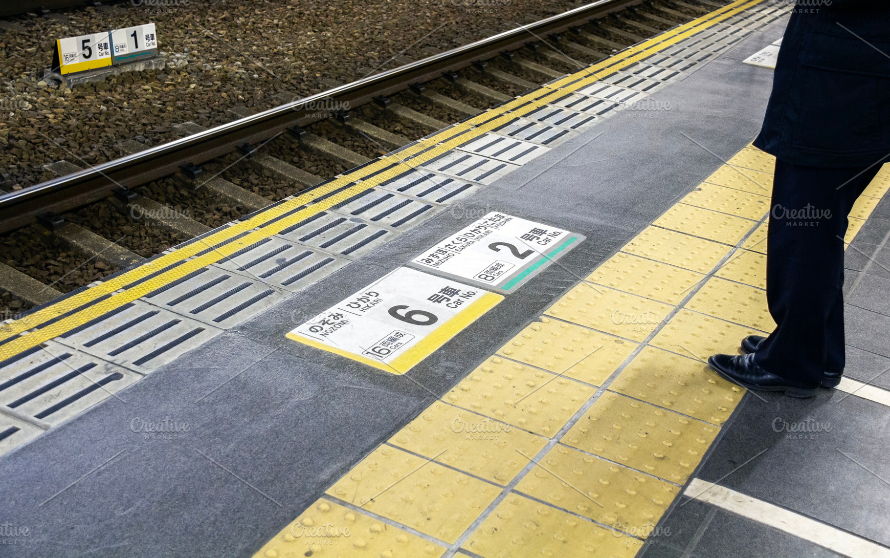 Signs on station platform in Japan, a Transportation Photo by BOOCYS