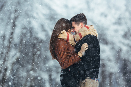 Happy couple in snow park featuring amazing, snow, and outdoor