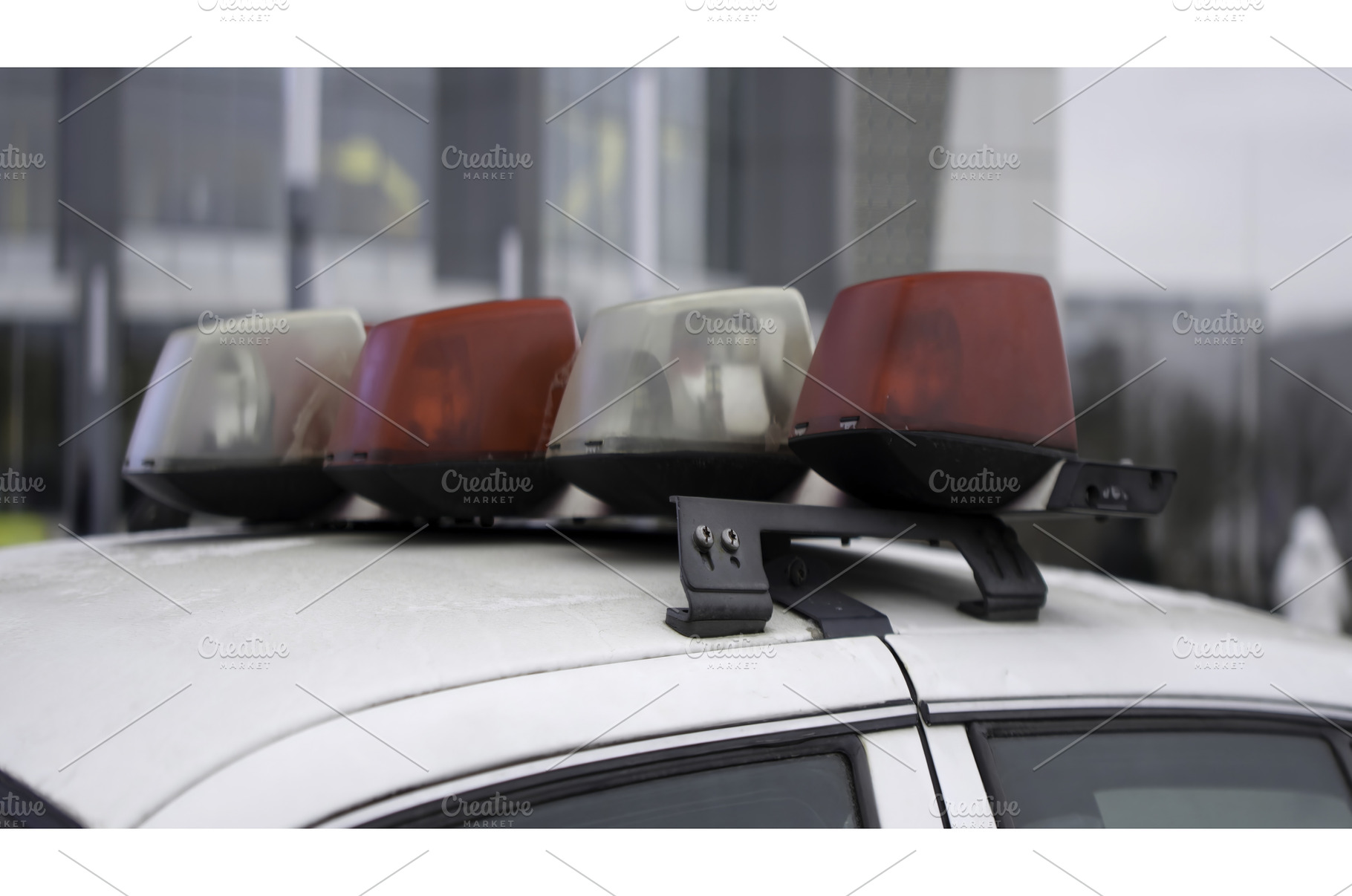 Flashing police car emergency lights, a Transportation Photo by Media Whale Stock