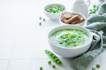 Fresh vegetable soup made of green peas, a Food & Drink Photo by Olena Rudo