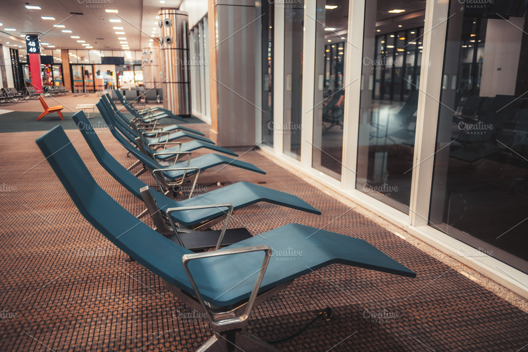 Empty airport lounge seats, an Architecture Photo by SkyNext