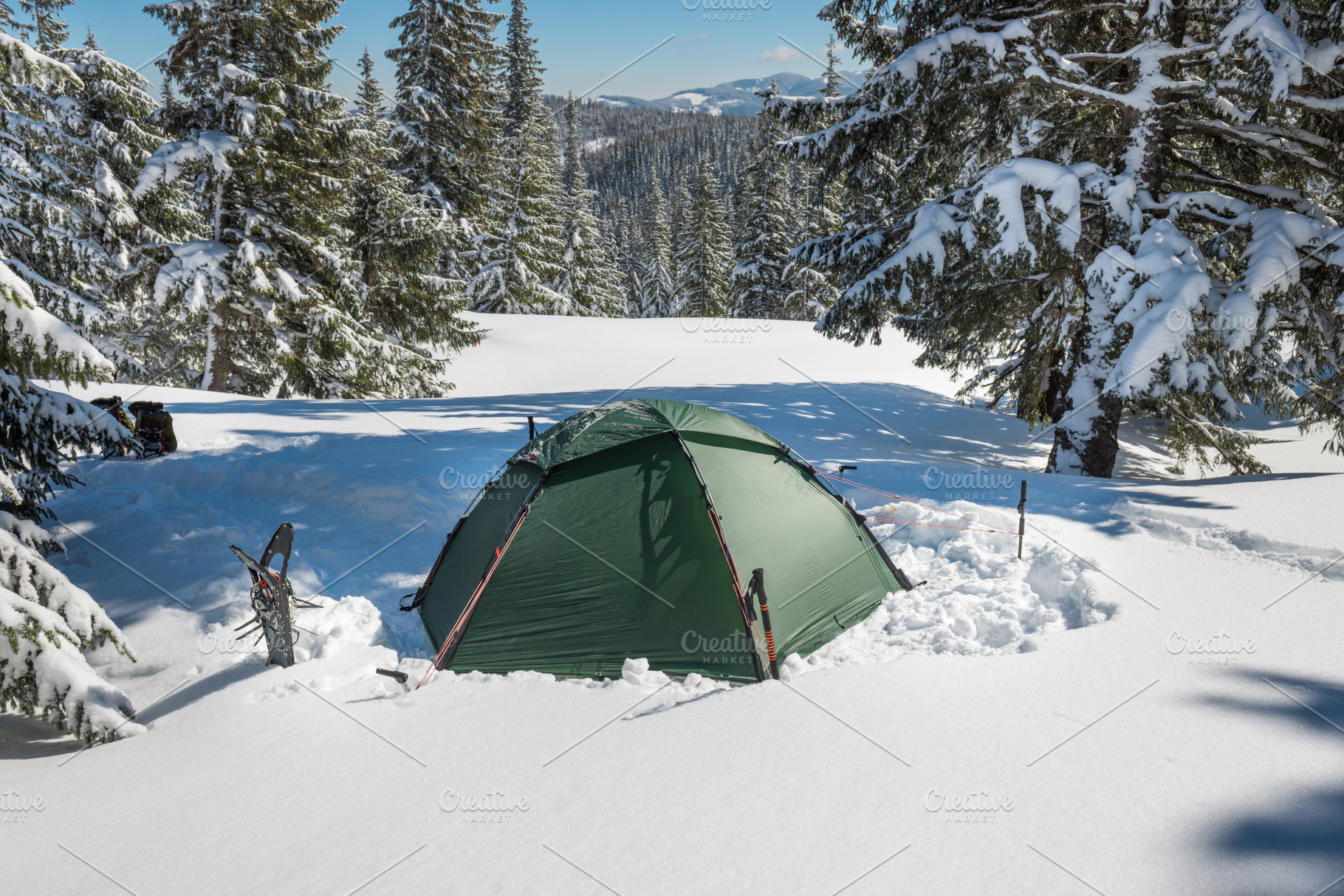 Green tent in winter forest, a Sports & Recreation Photo by Vapi