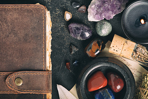 Flat Lay of Healing Crystals and Aromatic Candles with Leather J